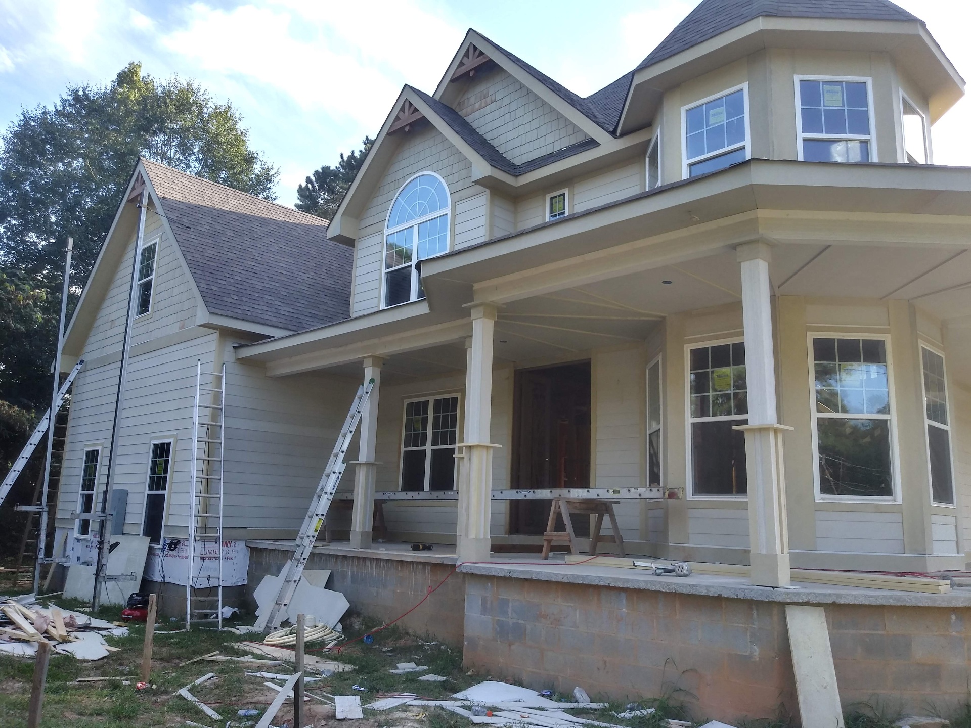 Gable end with siding and trim complete